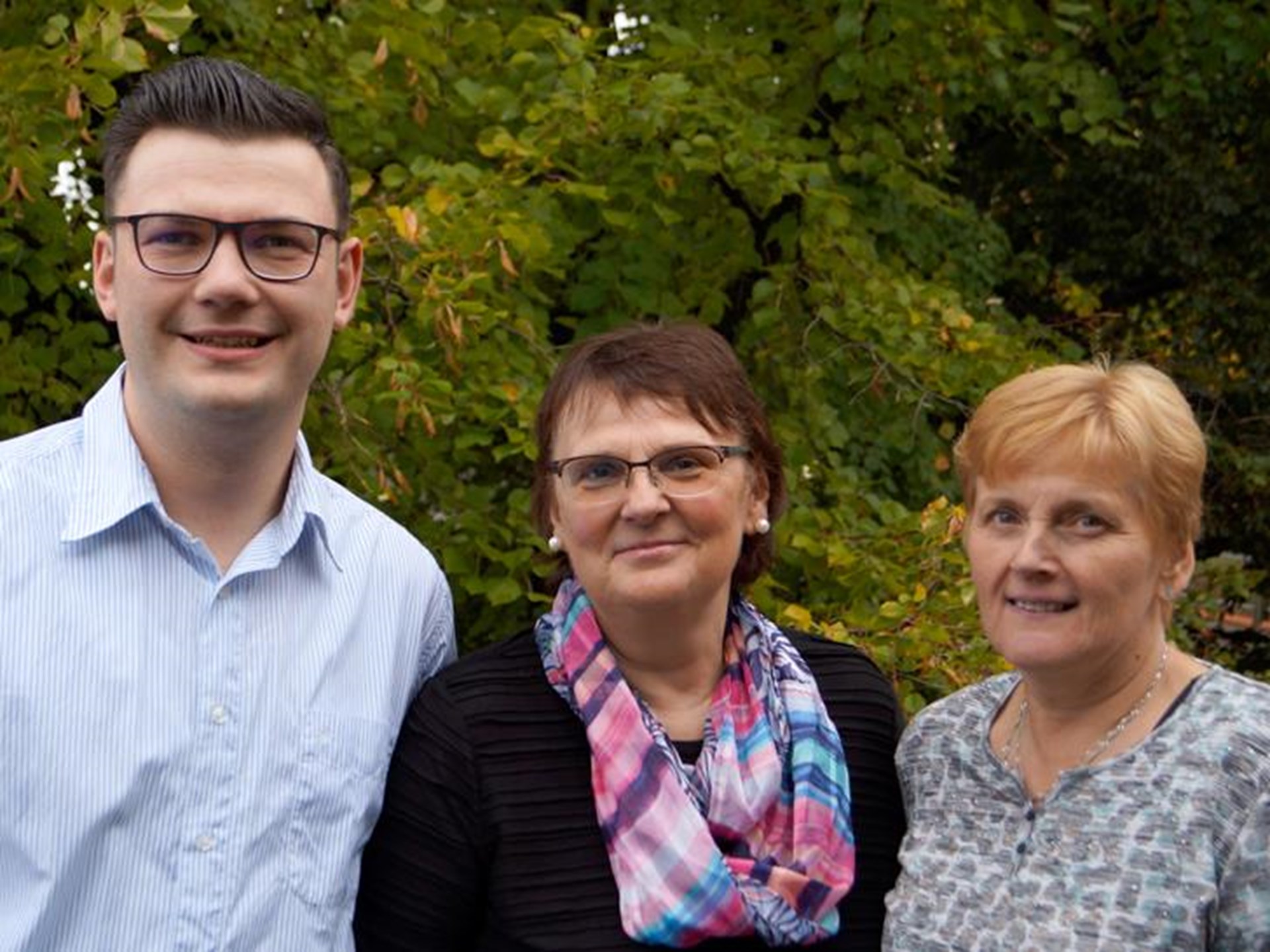 Portrait von drei Personen